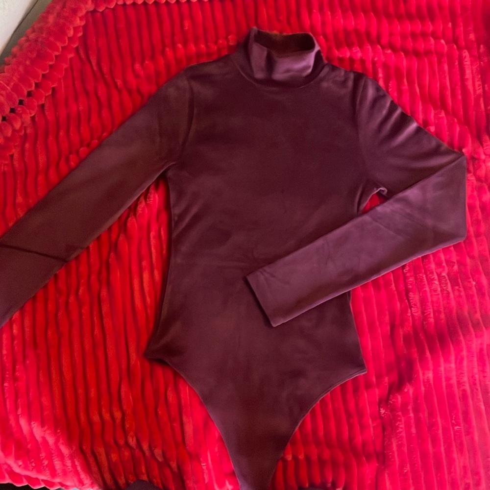 American Eagle Velvet body suit, never worn NWT. Extremely soft and stretchy